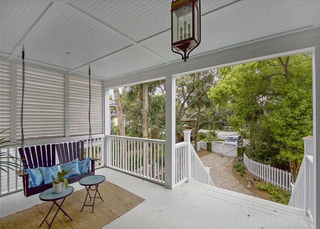 a porch swing at a wave call cottage