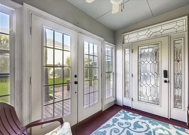 beautiful glass doors leading onto the deck at beach haven cottage