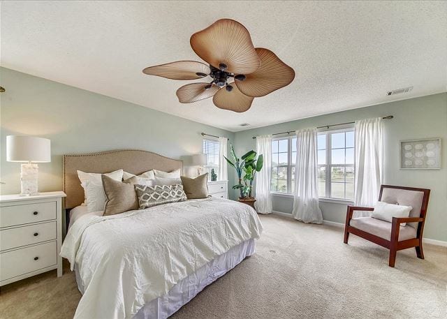 the master bedroom at marsh mermaid duplex on tybee island ga