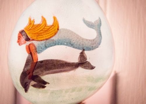 mermaid and her dolphin at sanford's place cottage