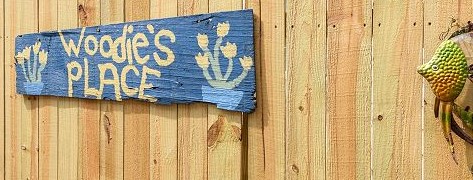 Woodie's Place sign