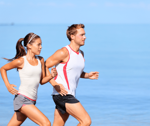 couple beach running